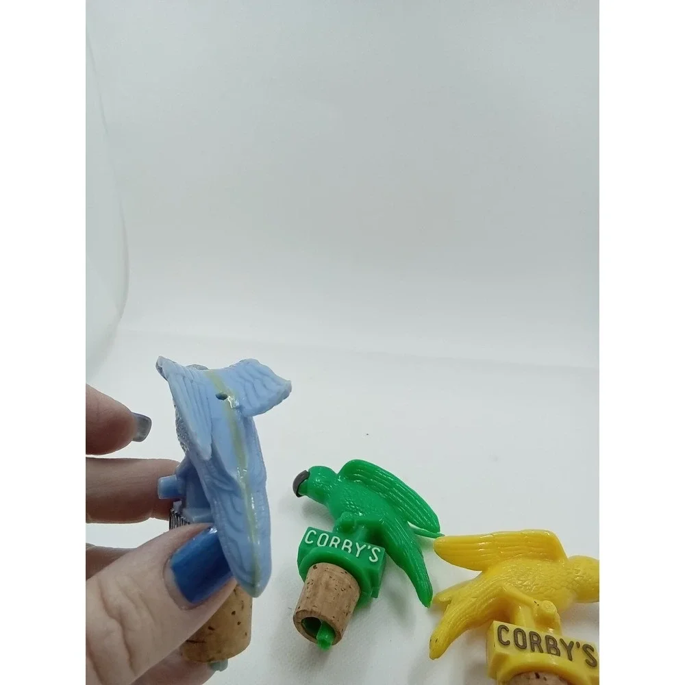 3 Corby's Whiskey Cork Pours Parrots, Blue one may‎ have been repaired.